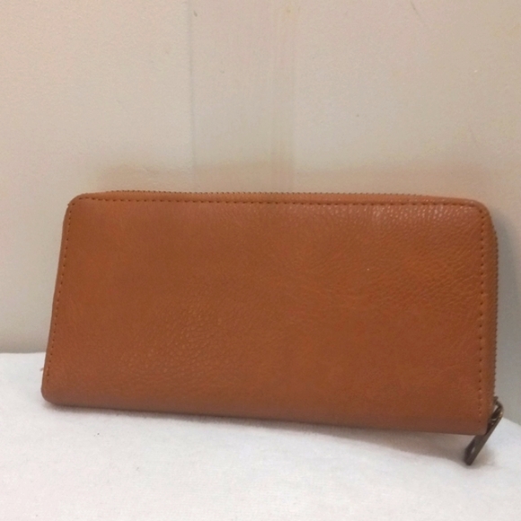 Tan Wallet with Elliptical Cutout W/Shimmering design behind - Picture 3 of 6